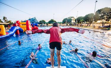 Boy diving into pool