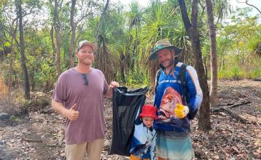 Two men from the last year's Great Spring clean up along with a young boy