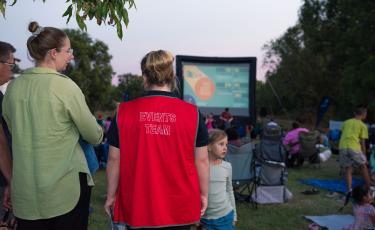 A vendor supplier at a community movie night