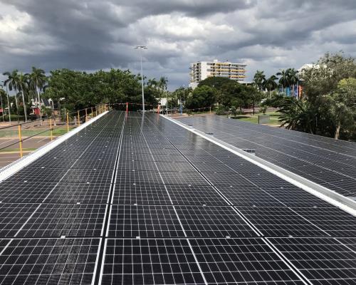 image: Solar pannels with Palmerston building in the background