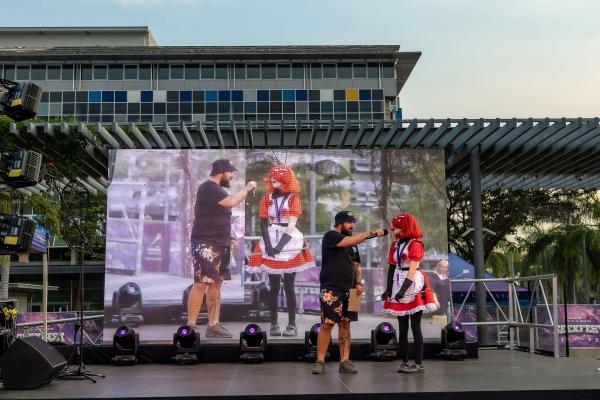 image: cosplay artist on stage