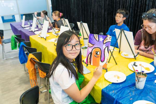 image: Youth painting mike at PYF