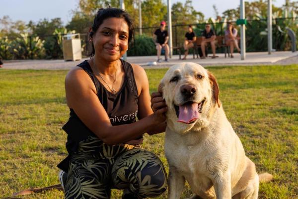 Dog owner and dog at Zuccoli Dog park